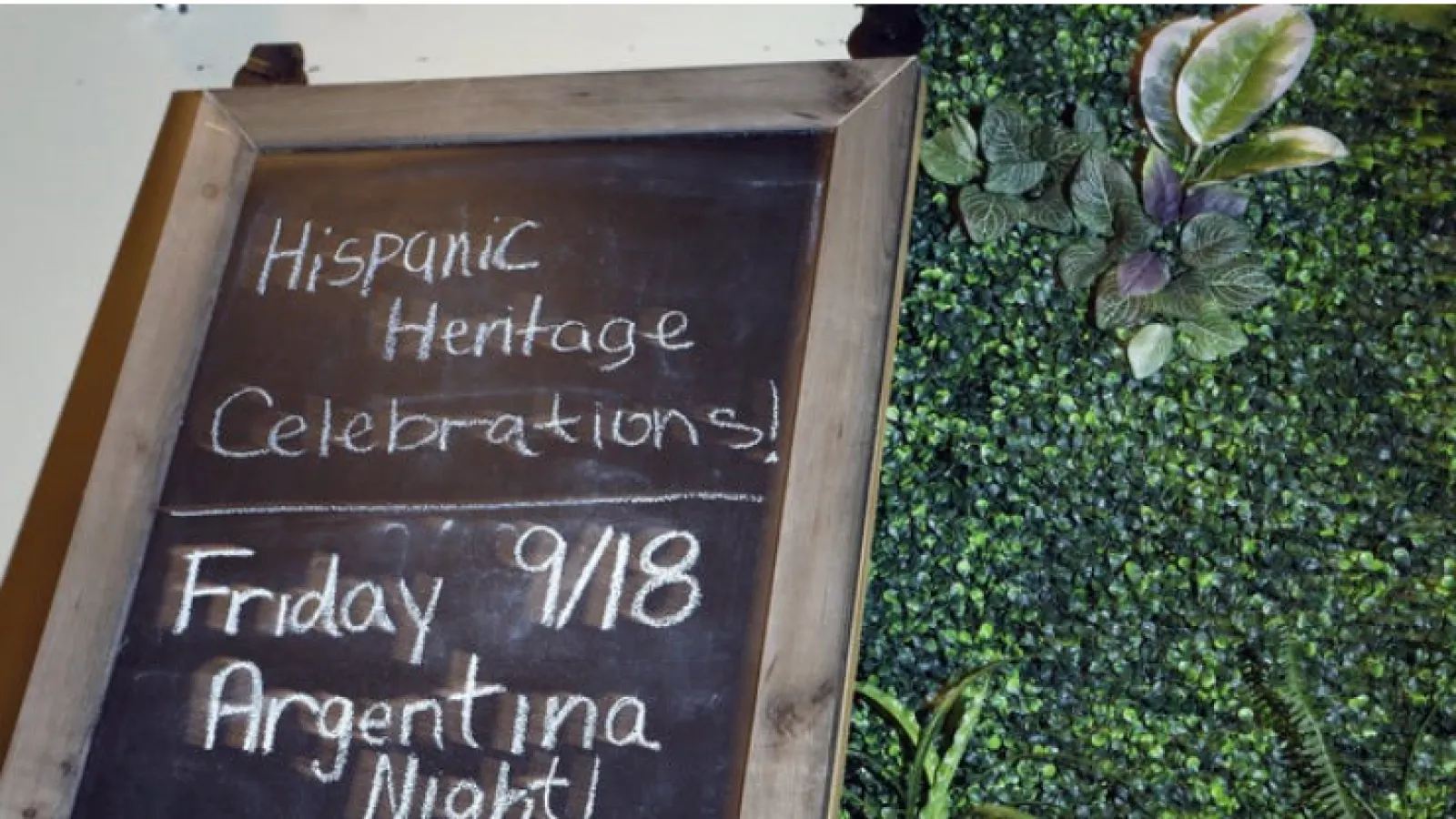 A chalkboard advertises Palmas Tropical Escape restaurant's celebration of Hispanic Heritage Month. Eric Albrecht/The Columbus Dispatch.