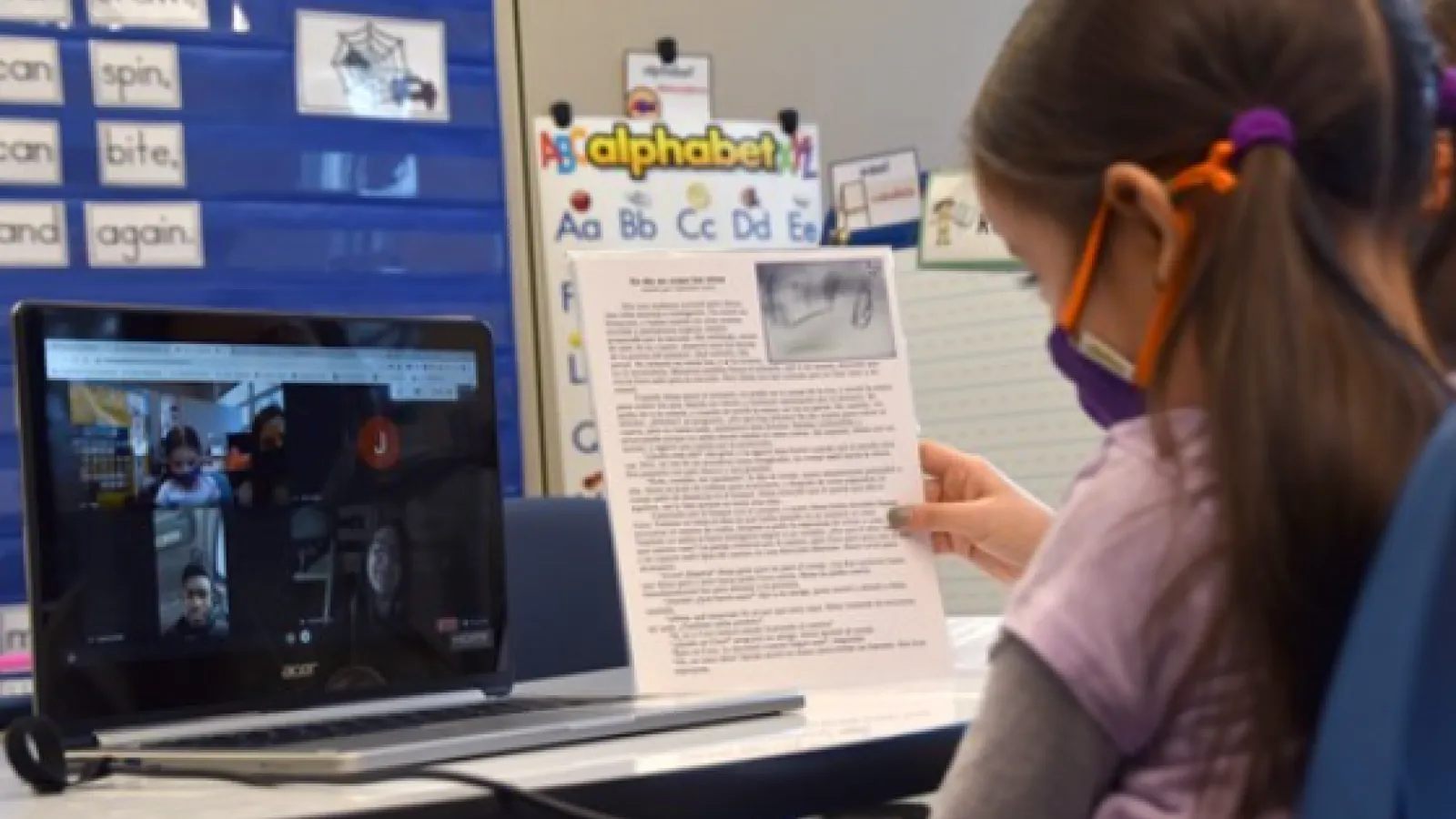 Longfellow elementary student reading bilingual storybook - photo courtesy of Westerville City School District website
