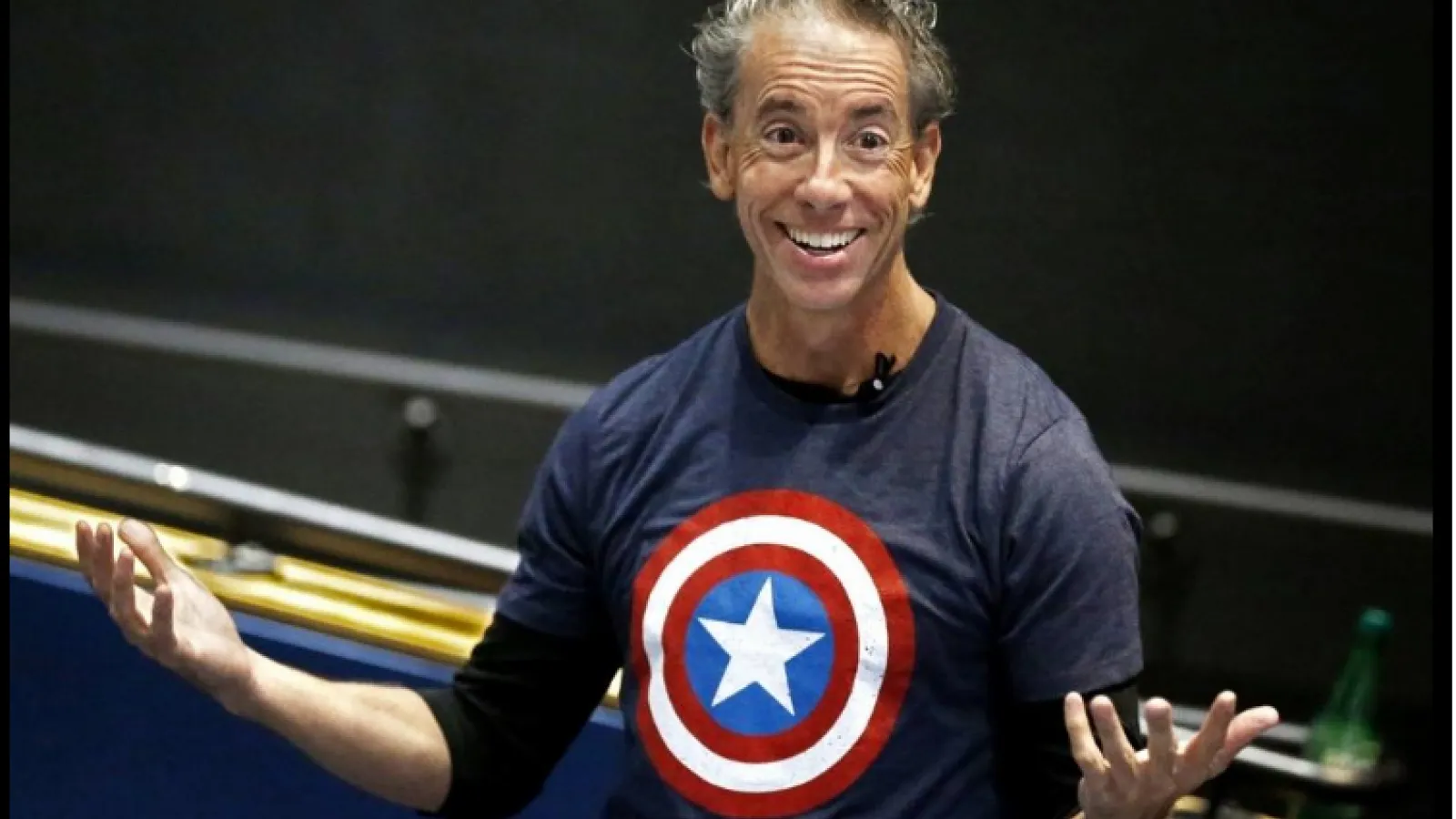 Prof. Frederick Aldama in a Captain America t-shirt, addressing a class at the Gateway Film Center