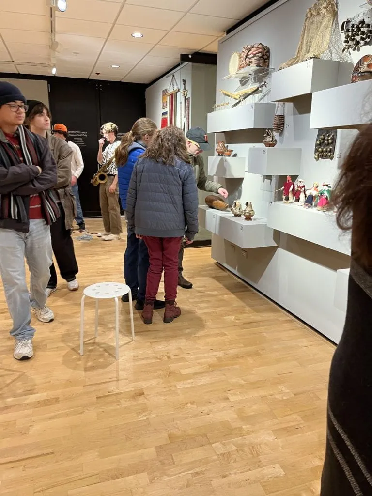 Visitors looking at art